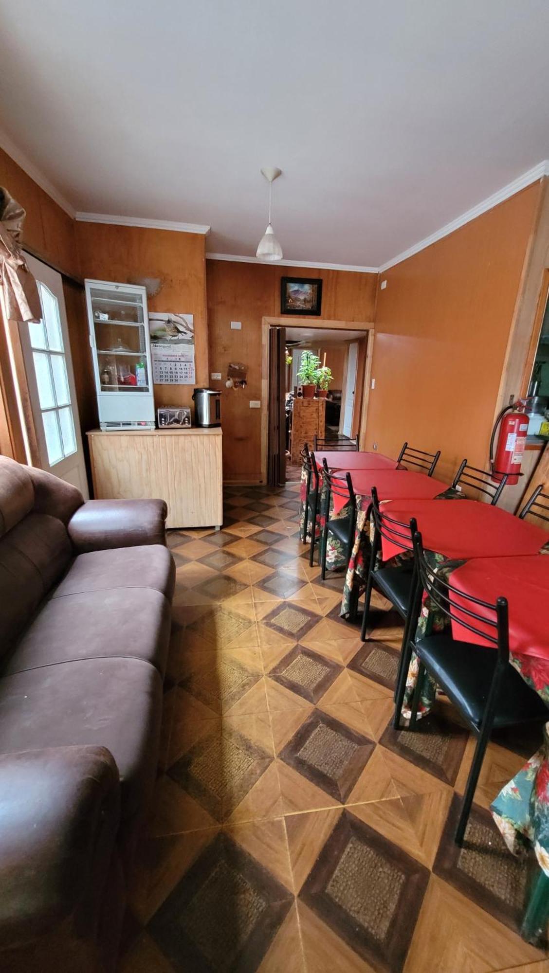 Hostal Traveltour El Campesino Puerto Natales Bagian luar foto