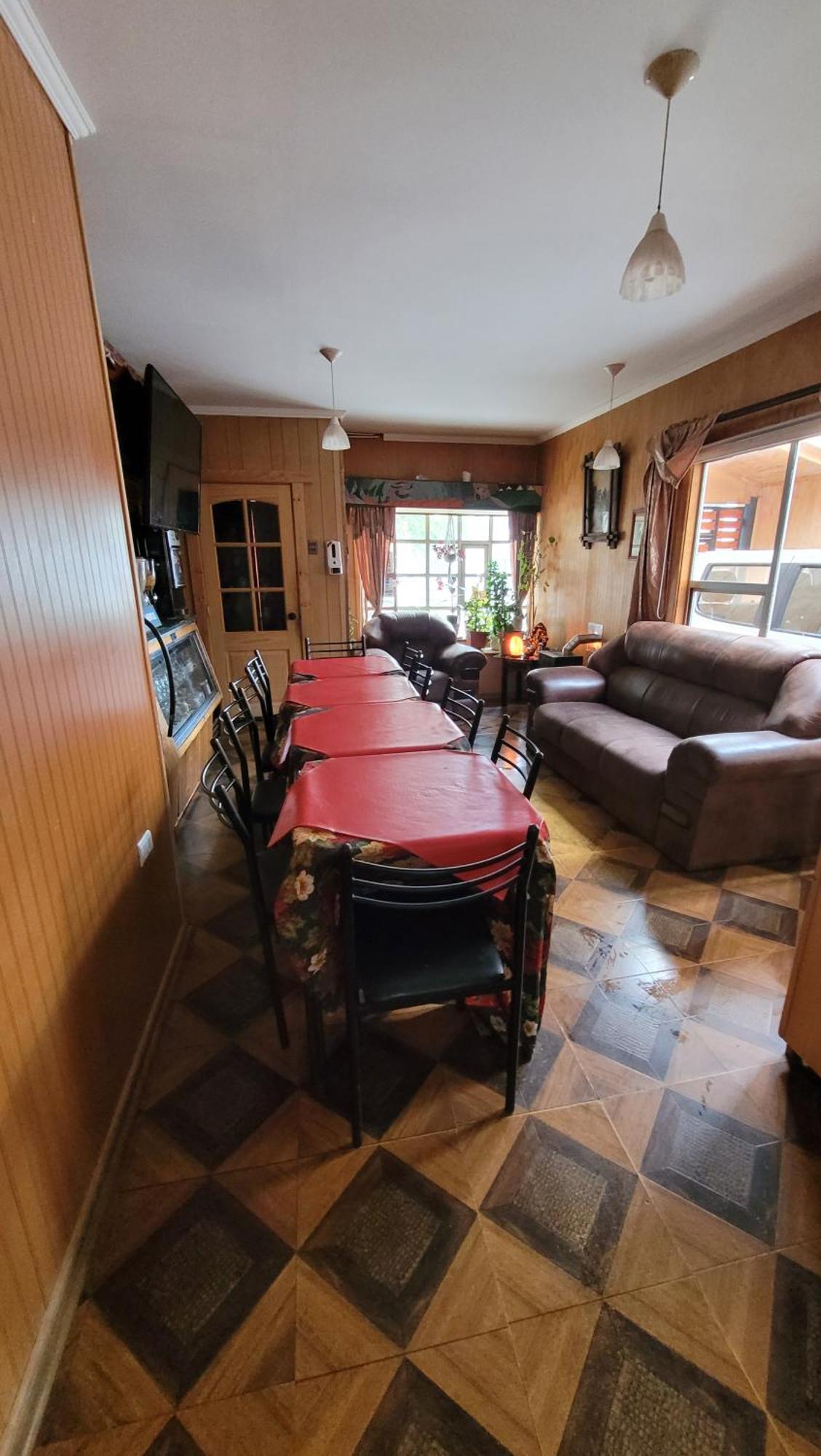 Hostal Traveltour El Campesino Puerto Natales Bagian luar foto