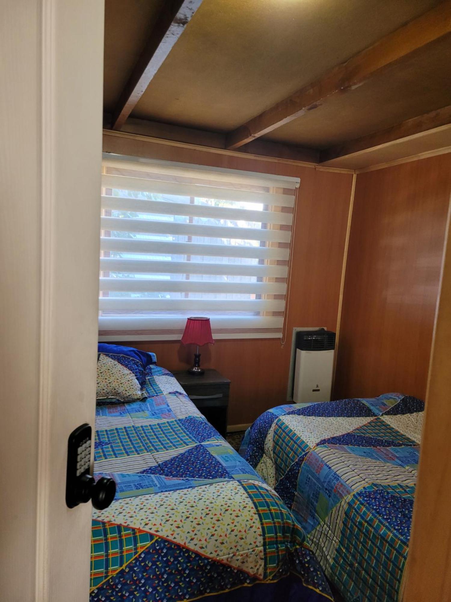 Hostal Traveltour El Campesino Puerto Natales Bagian luar foto