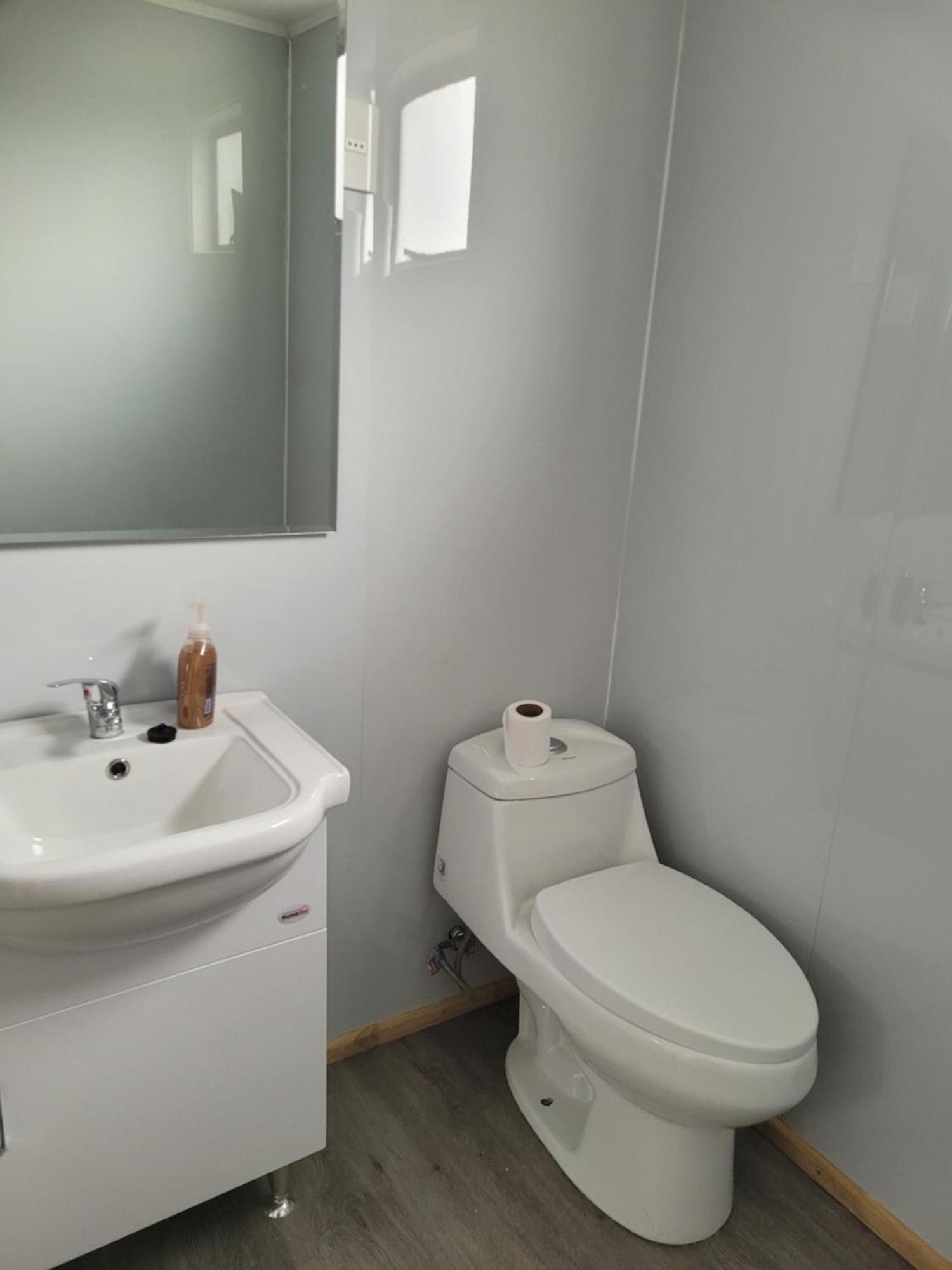 Hostal Traveltour El Campesino Puerto Natales Bagian luar foto